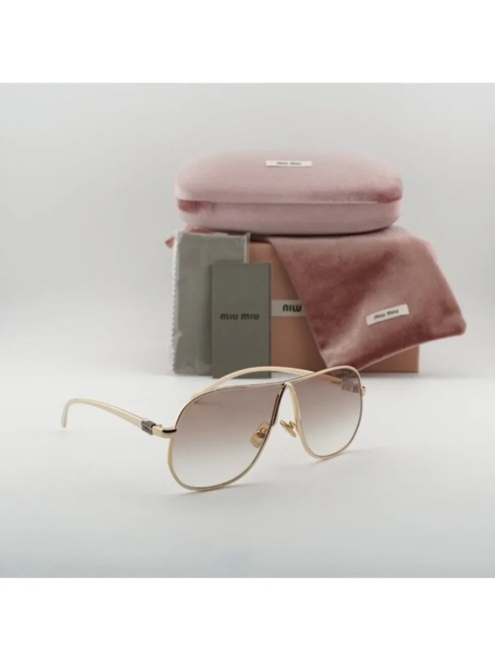 Miu Miu MUA56S 5AK90L Geometric Sunglasses – Gold/Brown Gradient